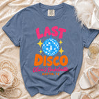 Blue t-shirt with "Last Disco Olivia's Bachelorette Austin, TX" text and disco ball graphic.