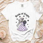 White t-shirt with "Bride of Fright" text and skeleton bride graphic.