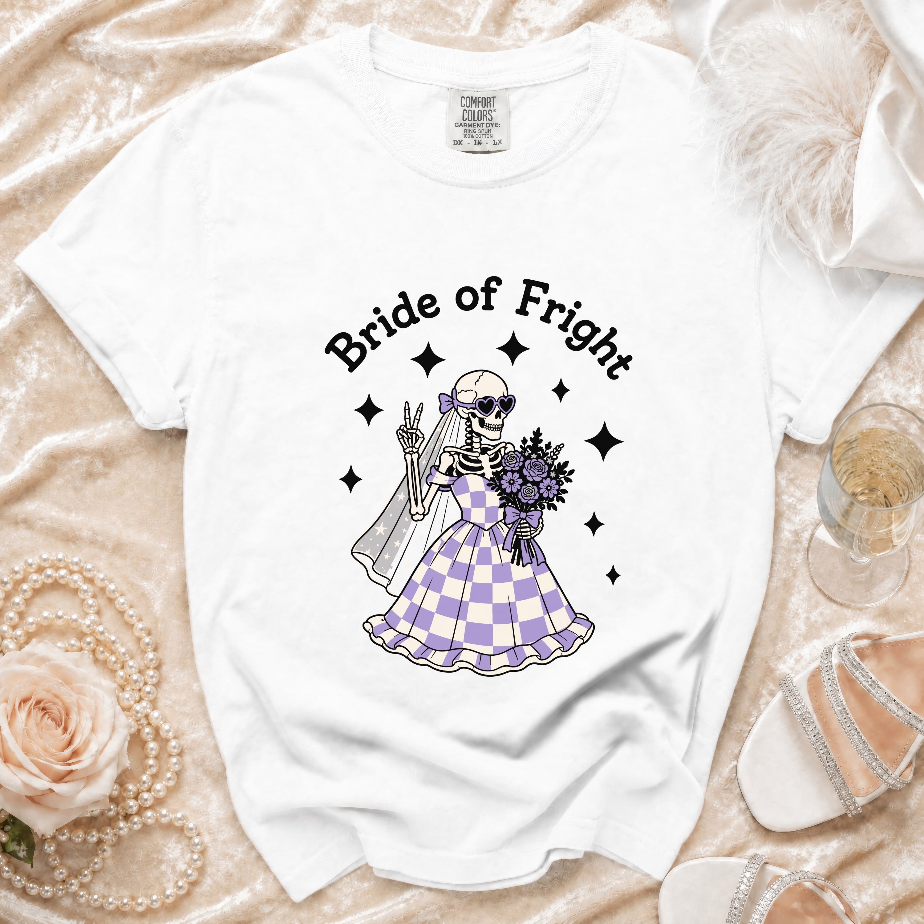 White t-shirt with "Bride of Fright" text and skeleton bride graphic.