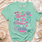 Mint t-shirt with "Maid of Honor Professional Bride Wrangler" and wedding icons.