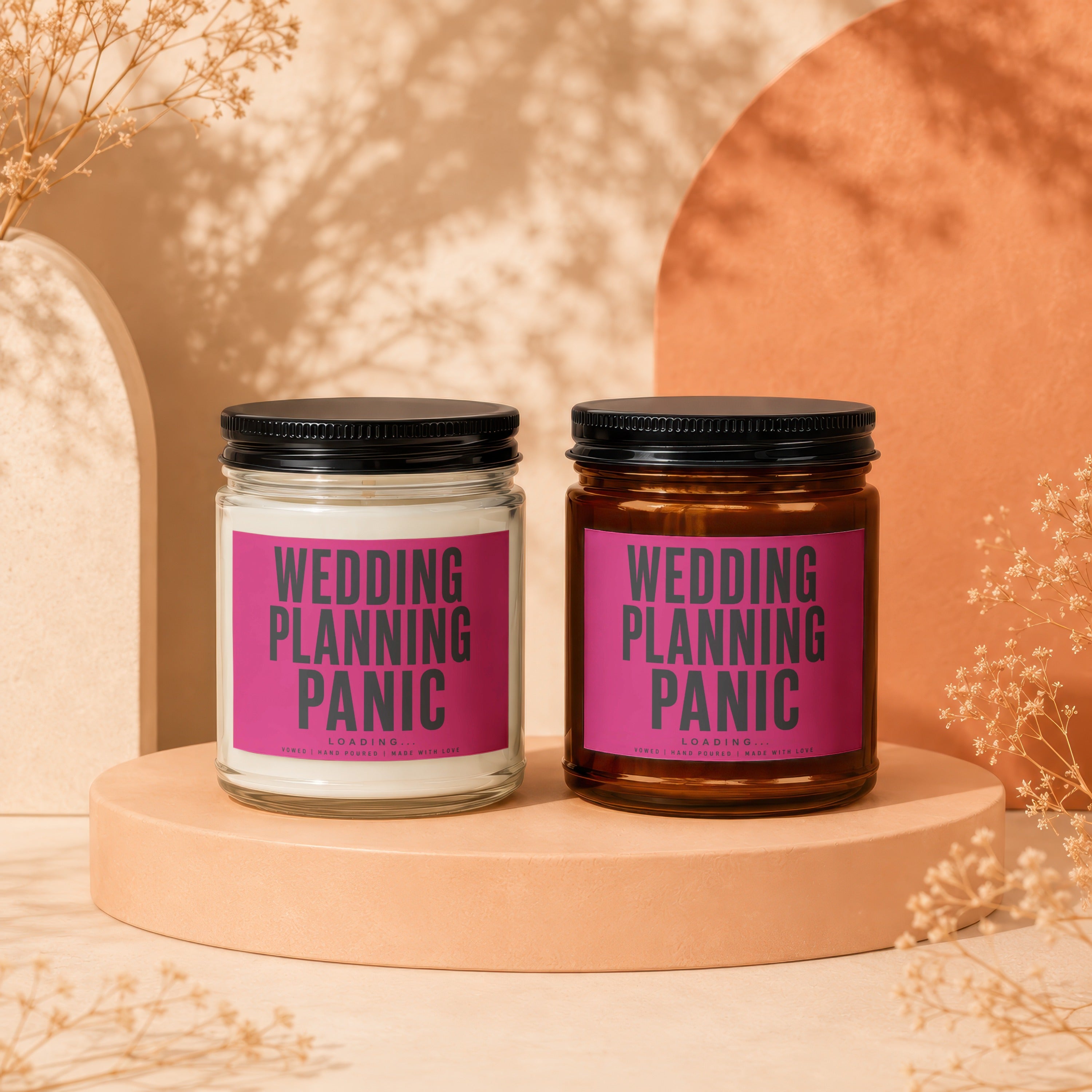 Two jars with black lids, one glass, one amber, with "WEDDING PLANNING PANIC" labels.