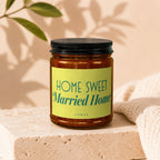 Amber candle in jar with yellow label reading "HOME SWEET Married Home" and "VOWED".