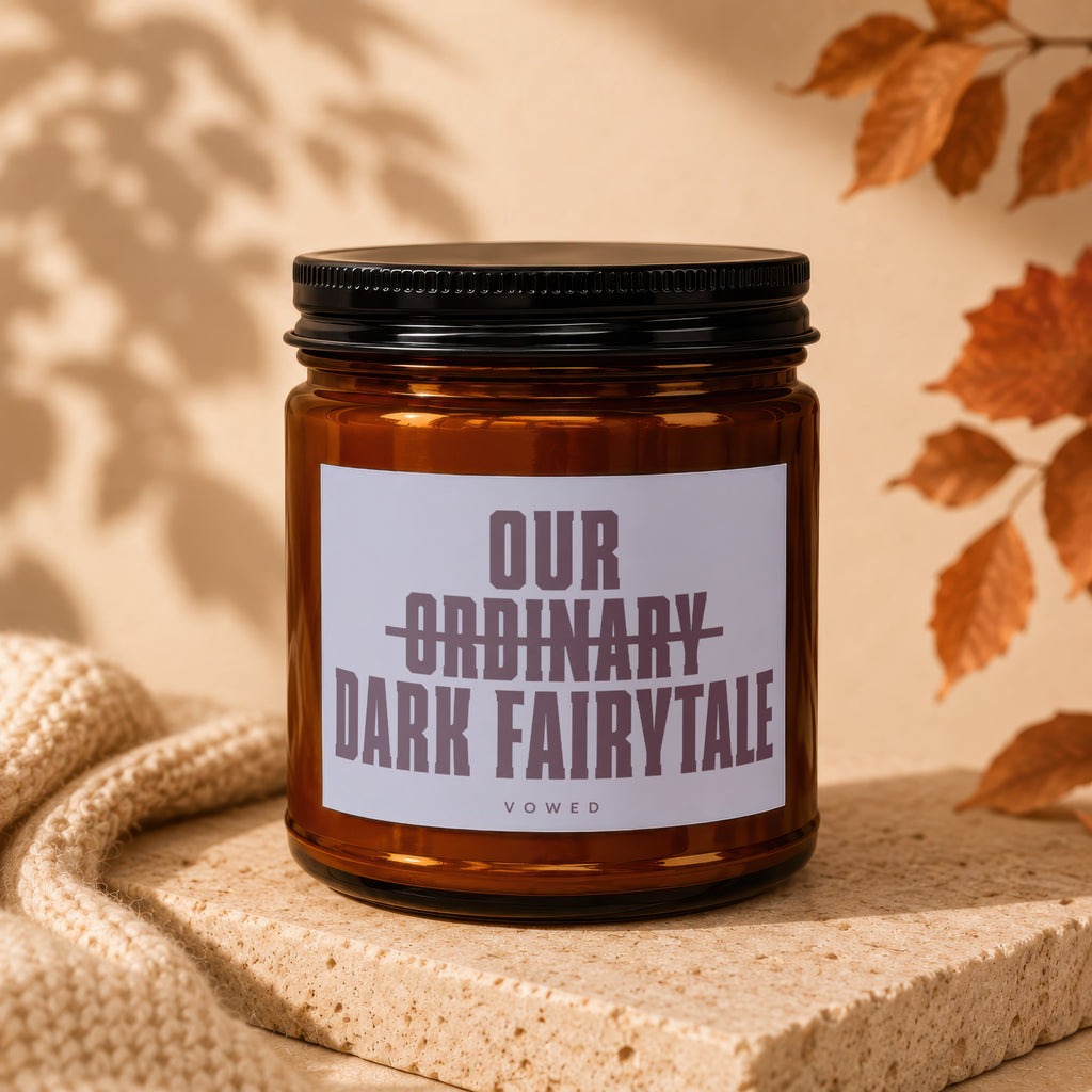 Amber candle with "Our Ordinary Dark Fairytale" label, "vowed" below.