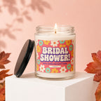 Candle with "Bridal Shower" label, gifts, games, and happy tears.