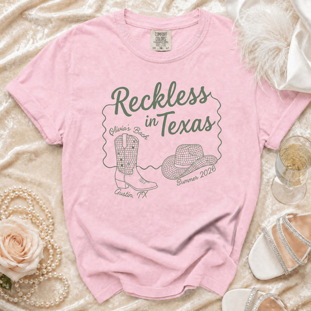 Pink t-shirt with "Reckless in Texas" design for Olivia's Bach in Austin, TX.