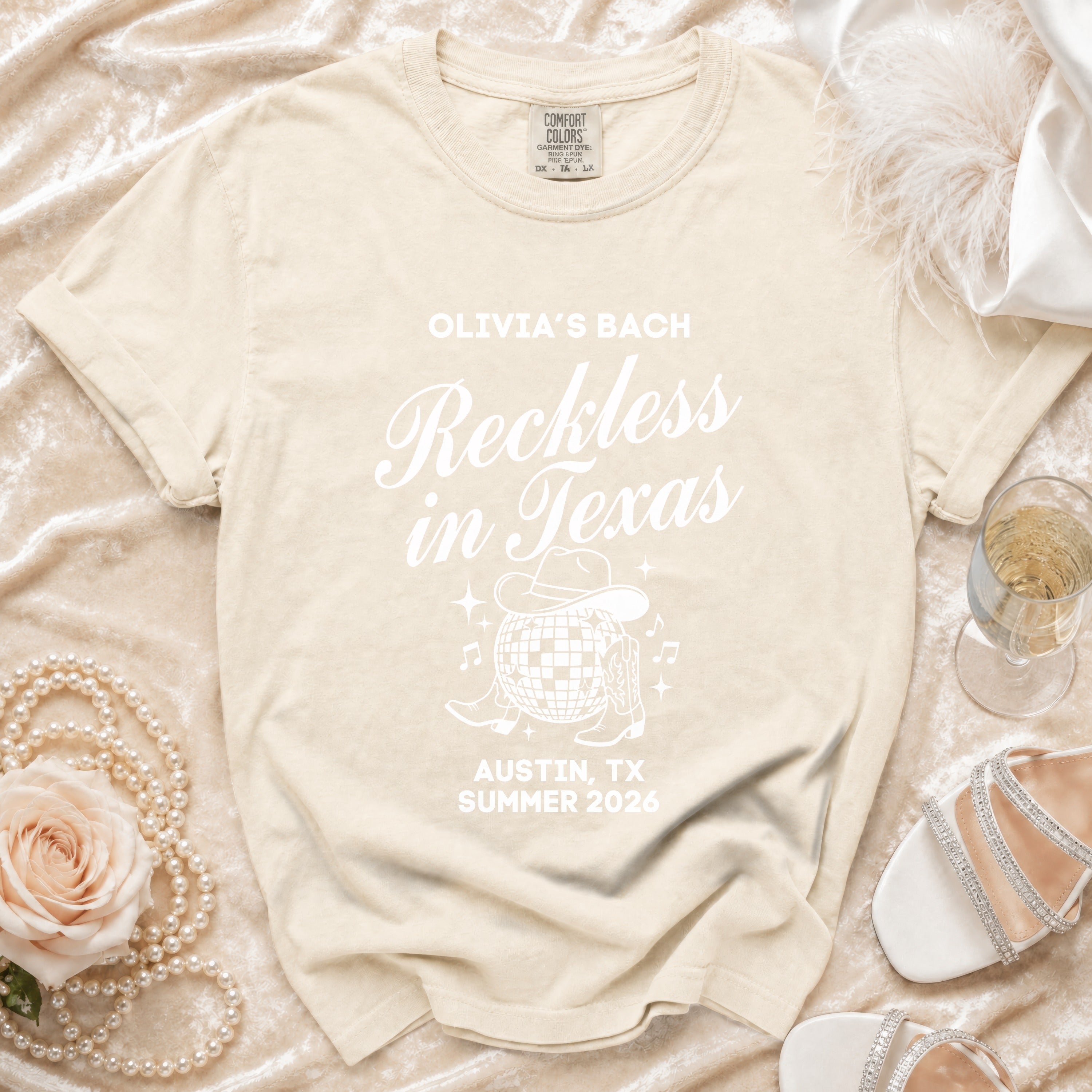 Cream t-shirt for Olivia's Bach "Reckless in Texas" Austin, TX Summer 2026.