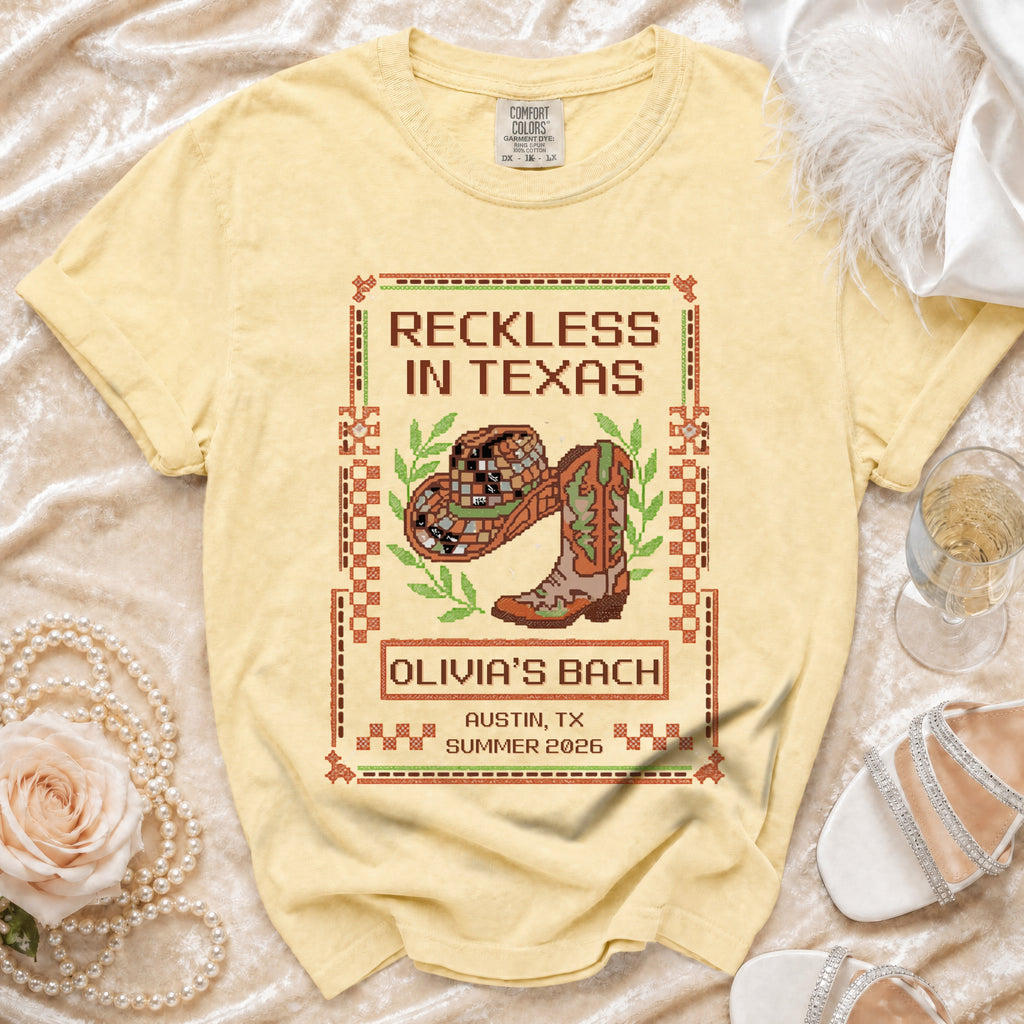 Yellow t-shirt with "Reckless in Texas" and Olivia's Bach details.