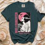 Bride of Frankenstein graphic t-shirt with pink moon and bats, "Happily Never After" text.