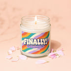 Lit candle in a jar with a label reading "FINALLY! WE CALLED IT ON DATE THREE VOWED".