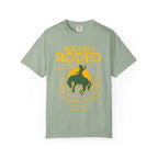 Green t-shirt with "Her Last Rodeo" text and rodeo graphic.