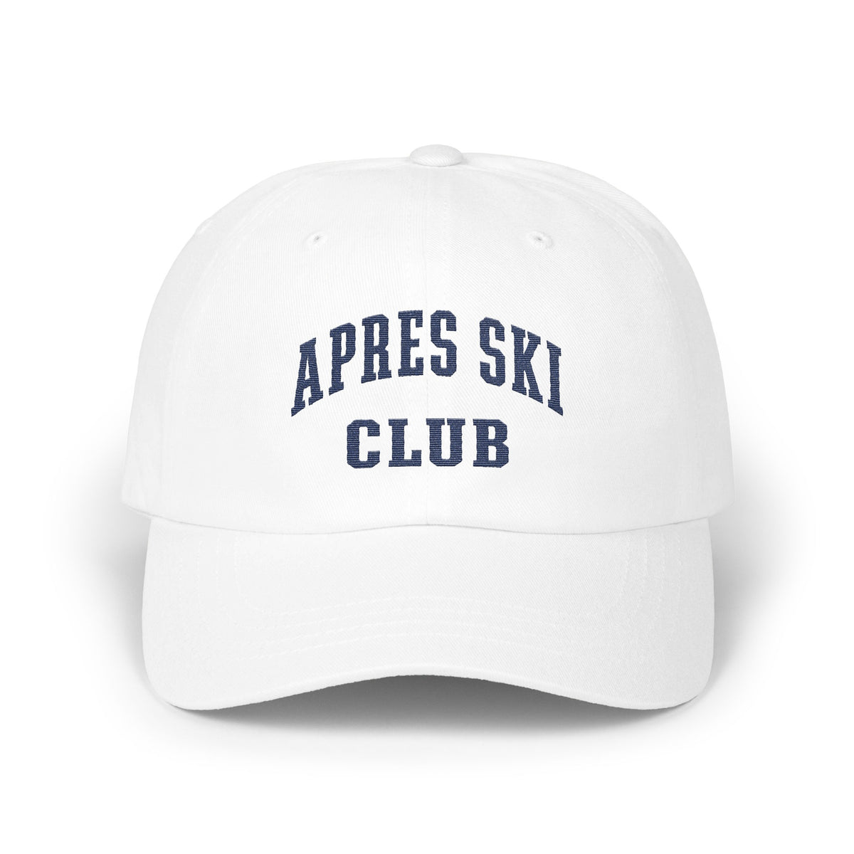 A white baseball cap featuring blue embroidered text that reads APRES SKI CLUB across the front panels.