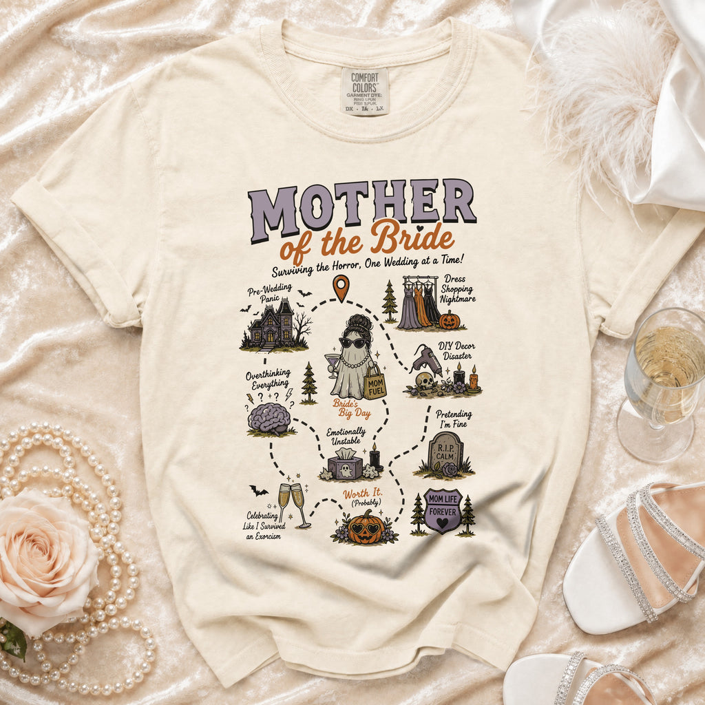 Cream t-shirt with "Mother of the Bride Surviving the Horror" graphic and wedding-themed illustrations.