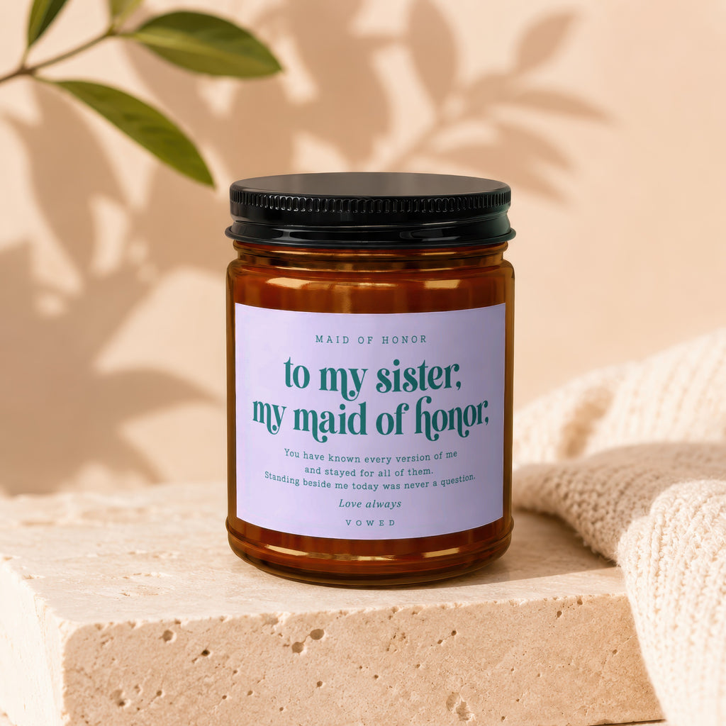 Candle with text "to my sister, my maid of honor" and a loving message.