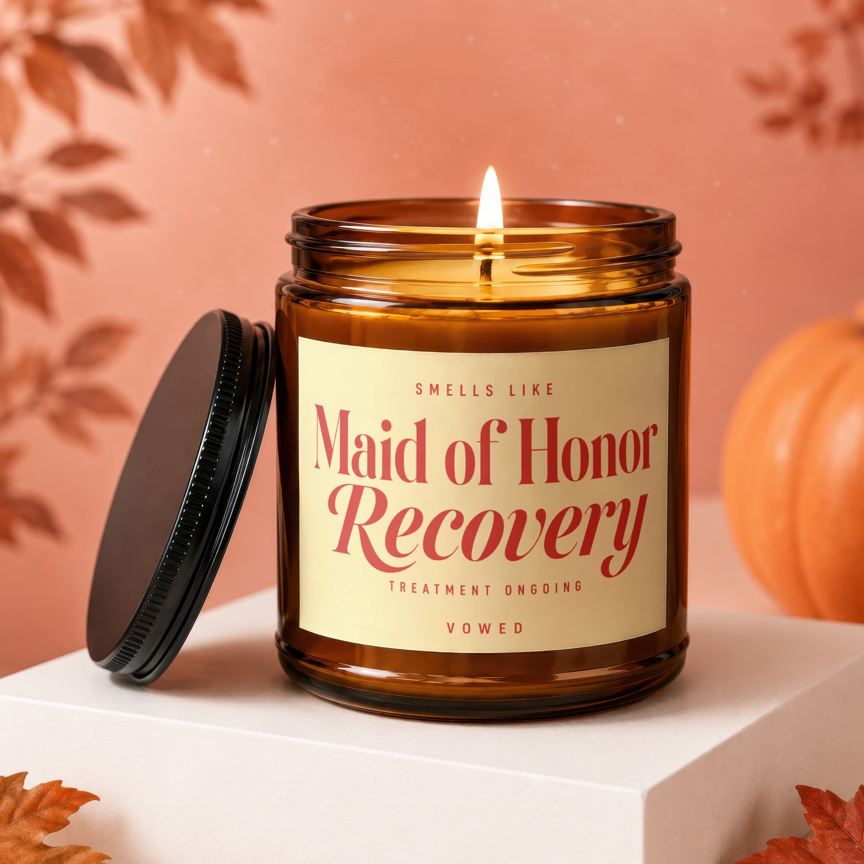 Amber candle with lit flame, label reads "Maid of Honor Recovery".