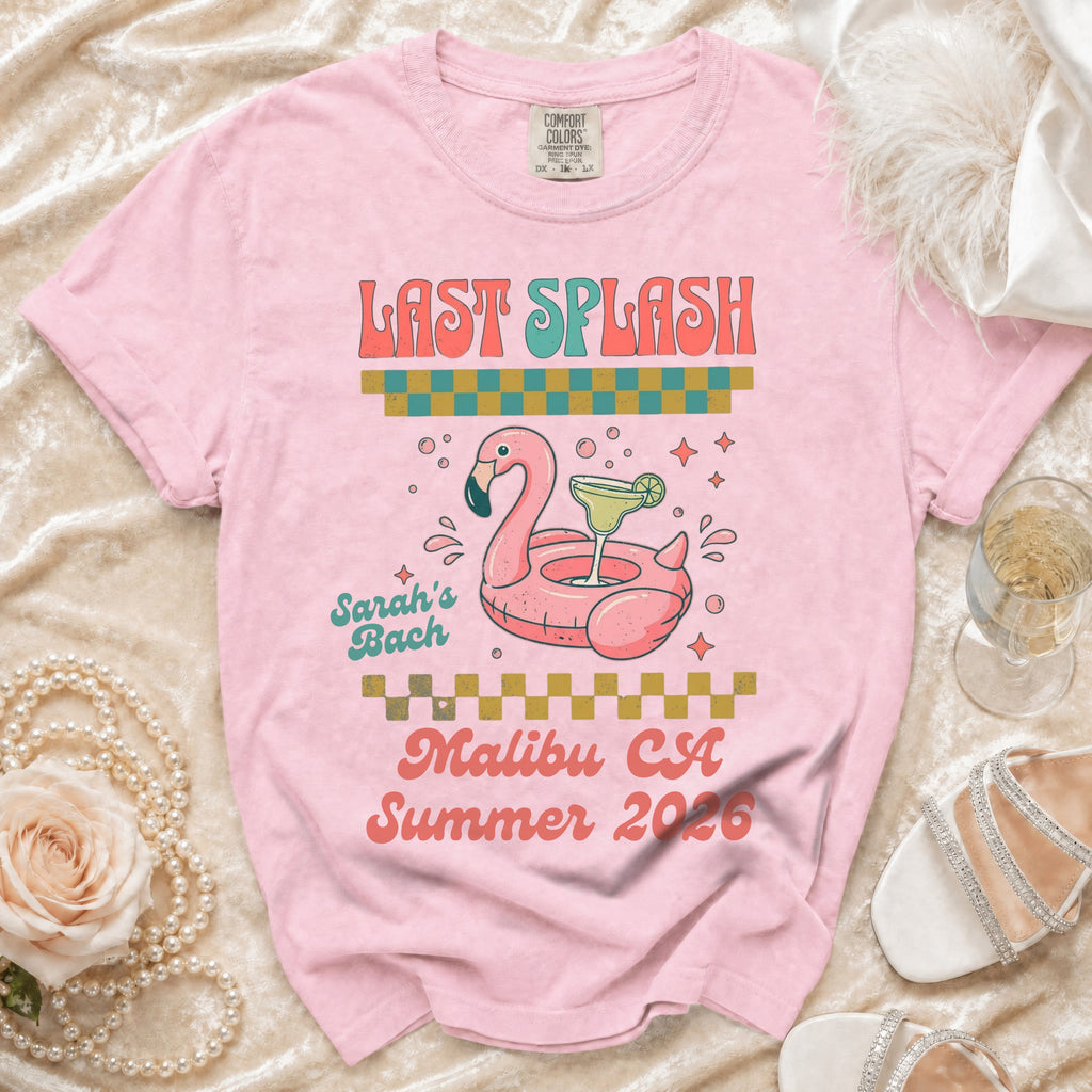 Pink t-shirt with "LAST SPLASH" and flamingo graphic for Sarah's Bach, Malibu CA Summer 2026.