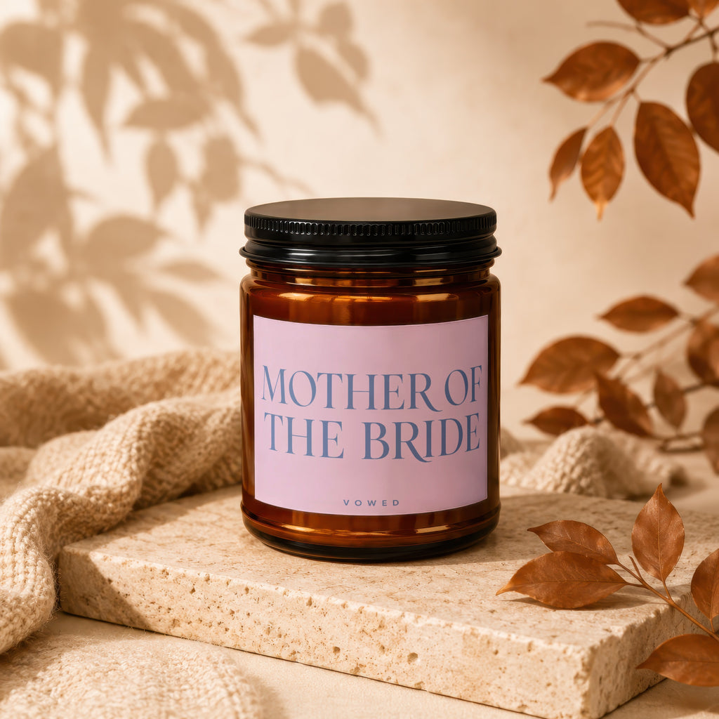 Amber jar candle with black lid labeled "MOTHER OF THE BRIDE".