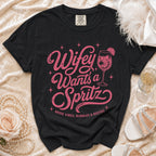 Black t-shirt with pink text "Wifey Wants a Spritz" and "Bride Vibes, Bubbles & Besties".