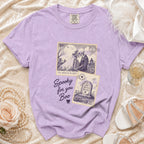 Lavender t-shirt with skeleton wedding and tombstone stamp graphics.