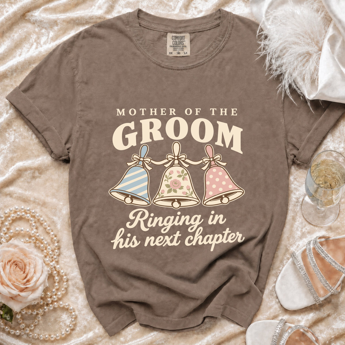 Brown t-shirt with "Mother of the Groom" and bells graphic.