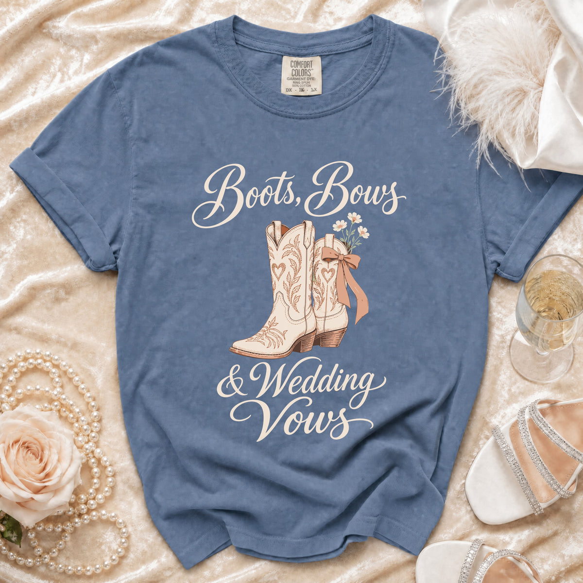 Blue t-shirt with "Boots, Bows & Wedding Vows" and cowboy boot graphic.