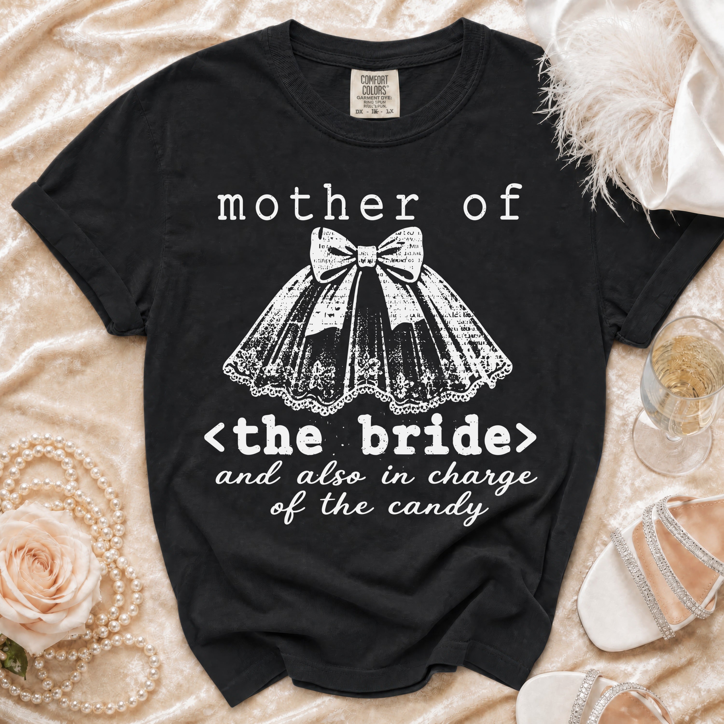 Black t-shirt with "Mother of the Bride" and "and also in charge of the candy" text.