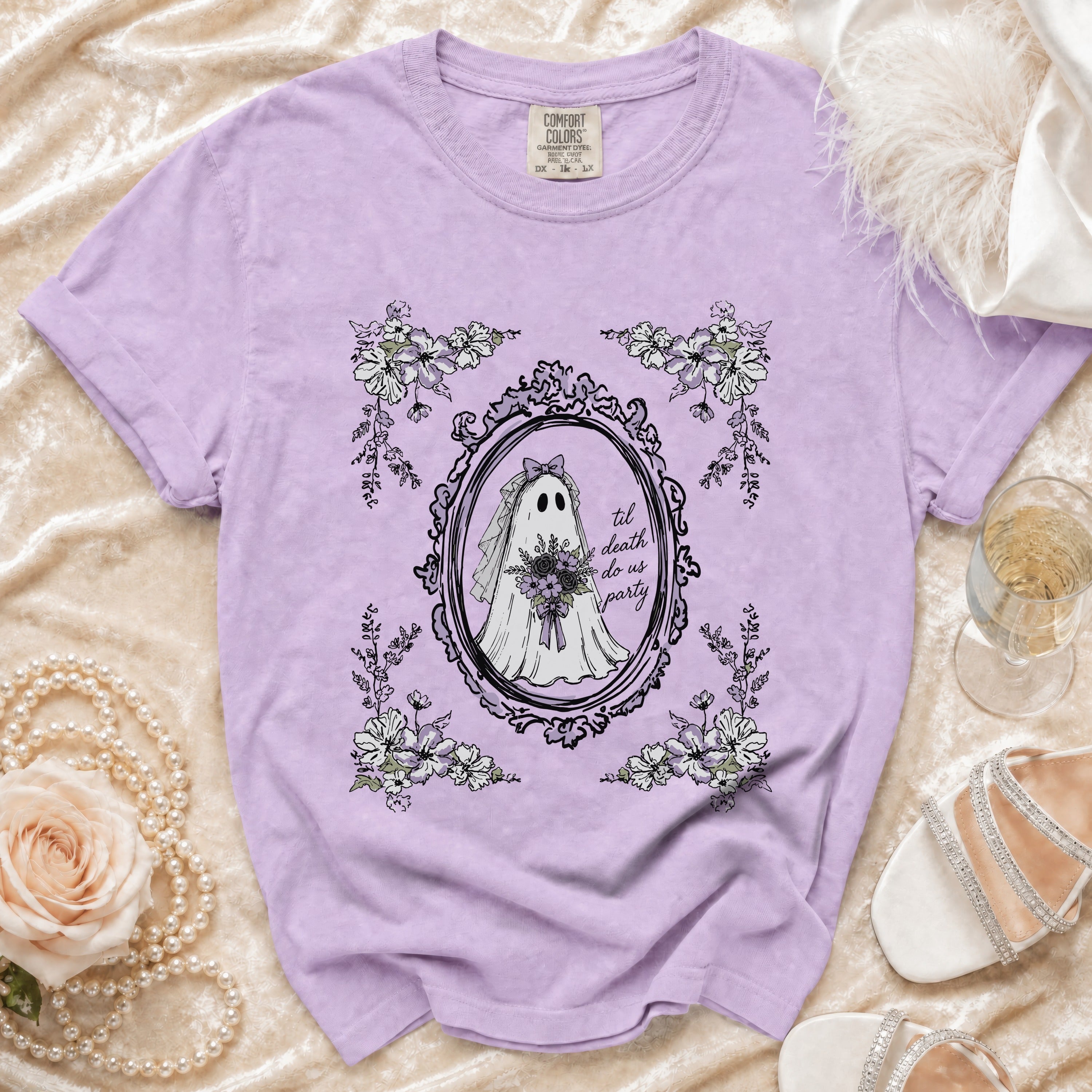 Purple t-shirt with ghost bride graphic and text "til death do us party".
