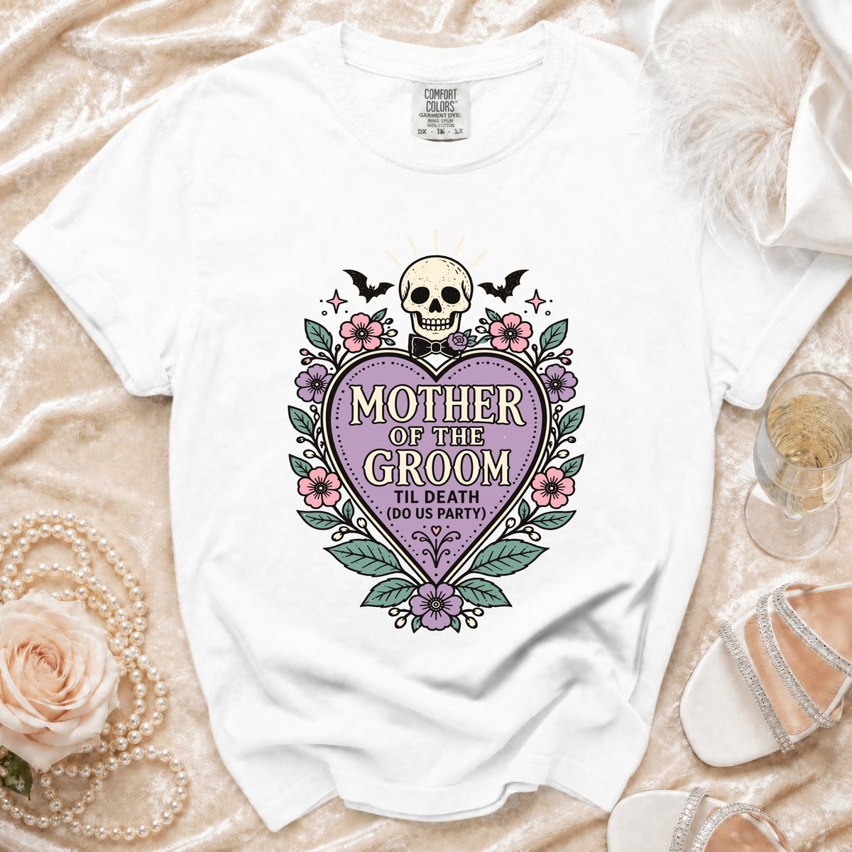 White t-shirt with "Mother of the Groom Til Death (Do Us Party)" graphic.