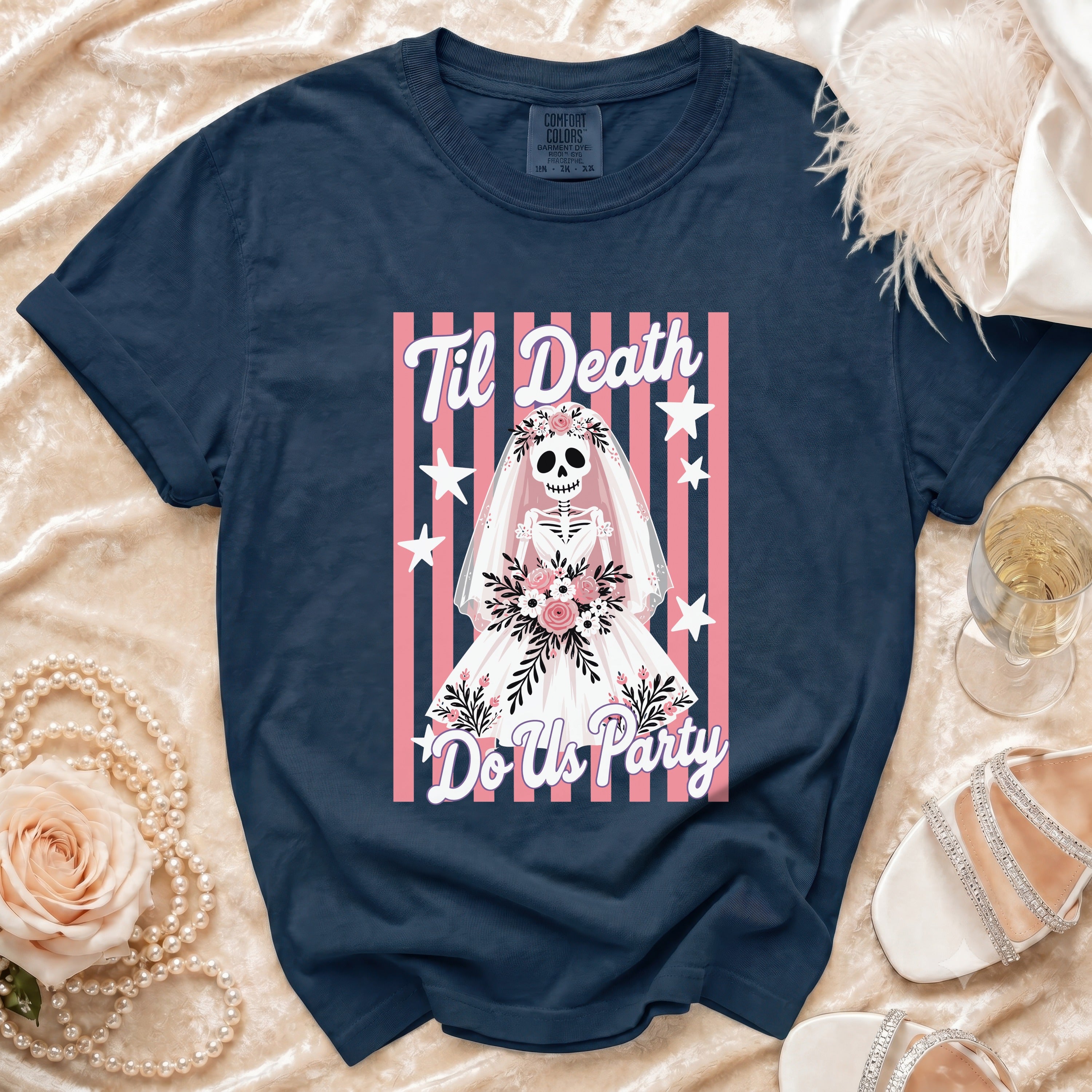 Navy t-shirt with skeleton bride graphic that reads "Til Death Do Us Party".