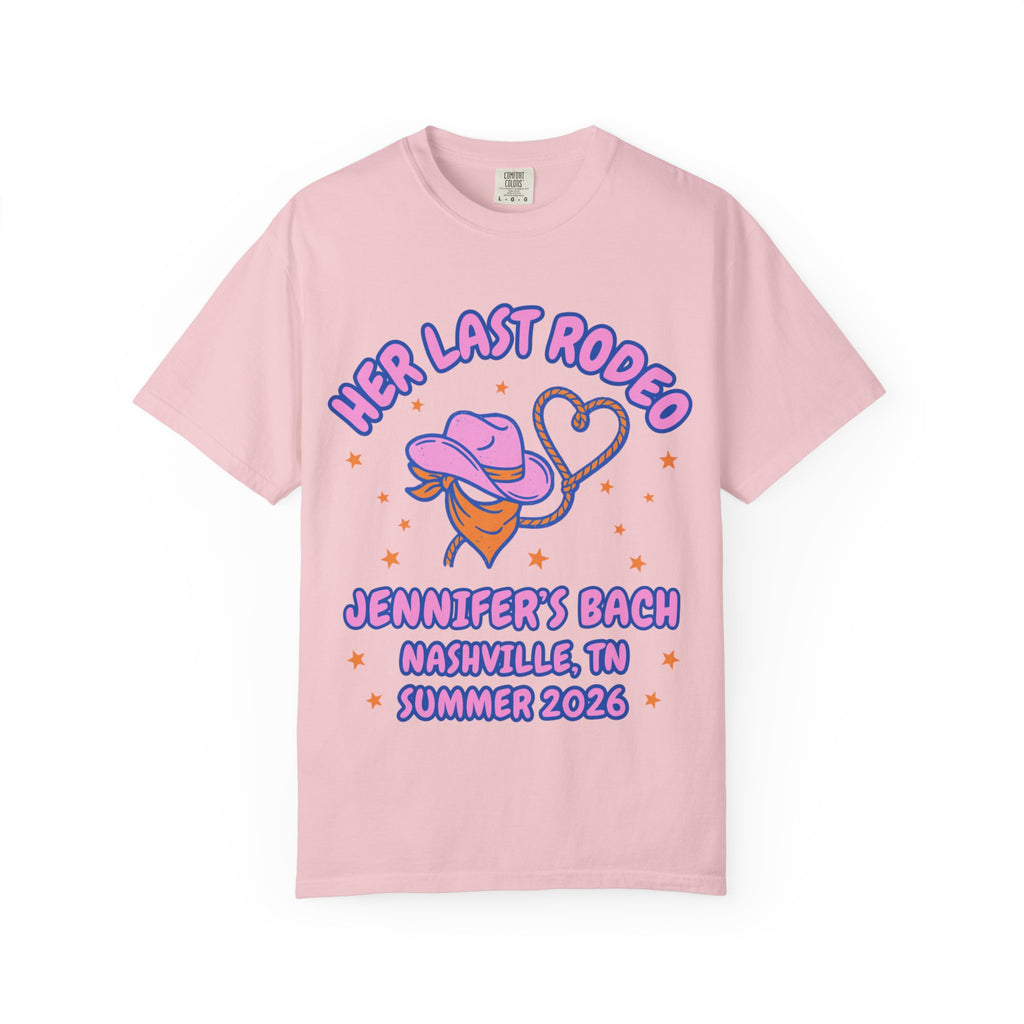 Pink t-shirt with "Her Last Rodeo" text, cowboy hat, lasso, and Nashville bachelorette details.
