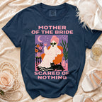 Navy t-shirt with "Mother of the Bride Scared of Nothing" graphic.