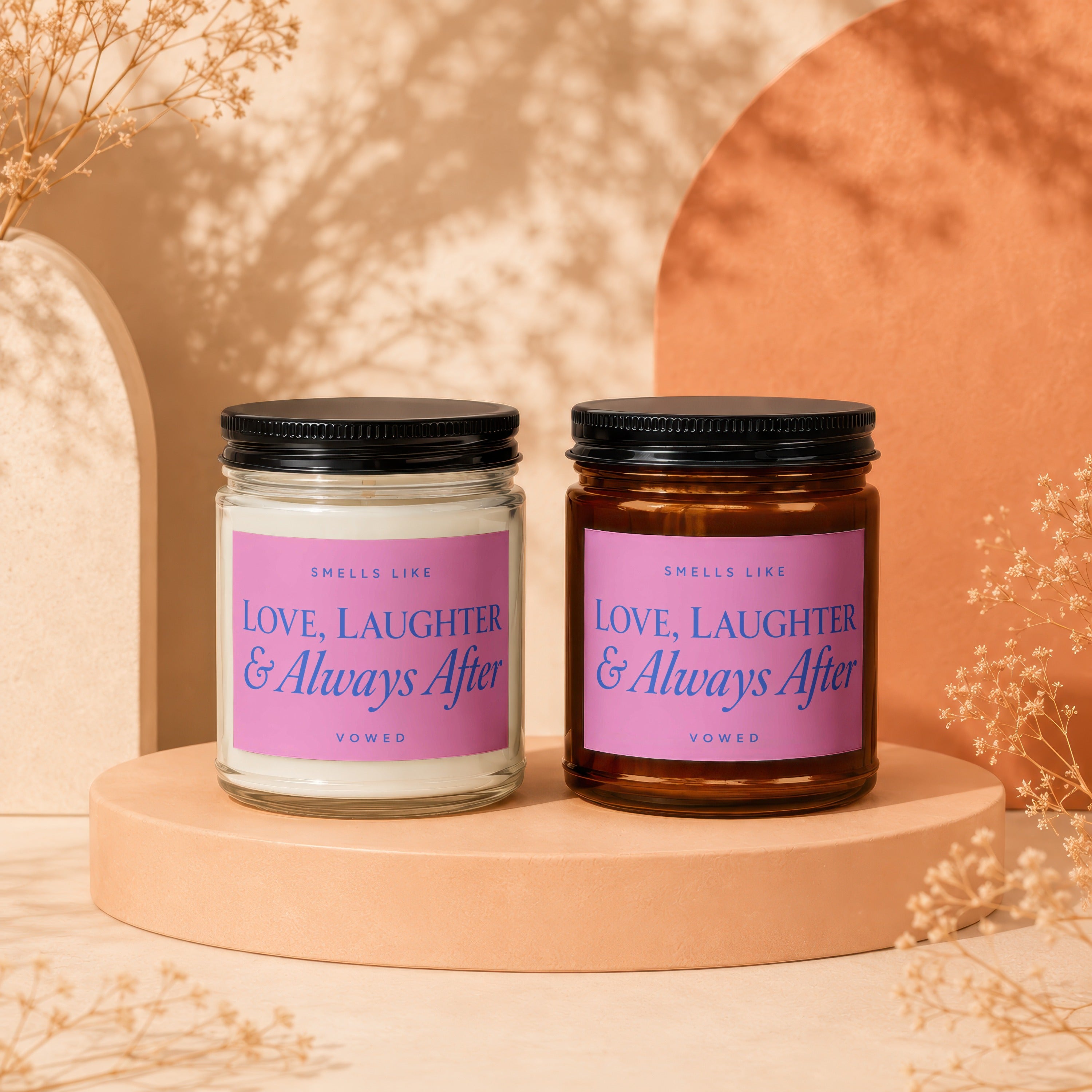 Two candles labeled "Love, Laughter & Always After" by Vowed.