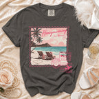 T-shirt with "Honeymooning Just Married" beach scene stamp graphic.