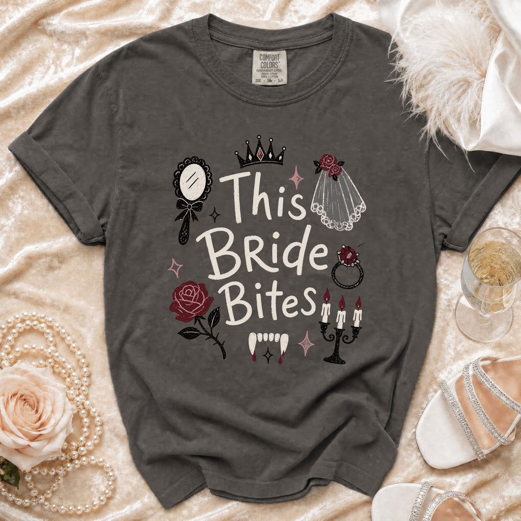 Dark grey t-shirt with "This Bride Bites" graphic and gothic wedding icons.
