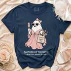 Navy t-shirt with ghost graphic holding champagne, heart sunglasses, and "Emotional Support Mom" tote bag.