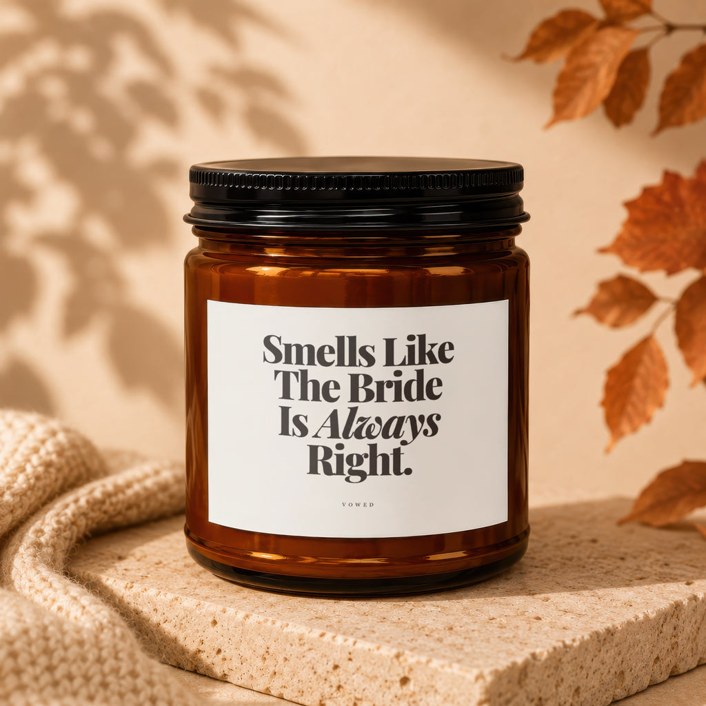 Amber candle with black lid labeled "Smells Like The Bride Is Always Right."