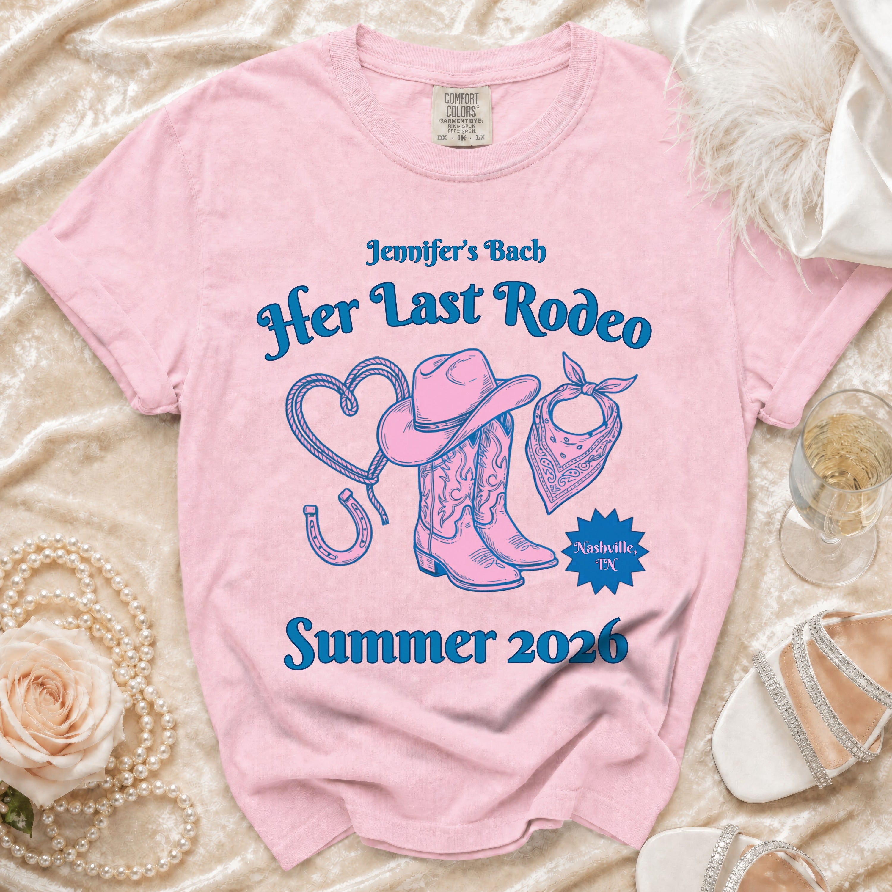 Pink t-shirt for "Jennifer's Bach - Her Last Rodeo" with Western graphics.