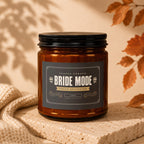 Amber jar candle labeled "Bride Mode Fully Activated" with vow-related text.