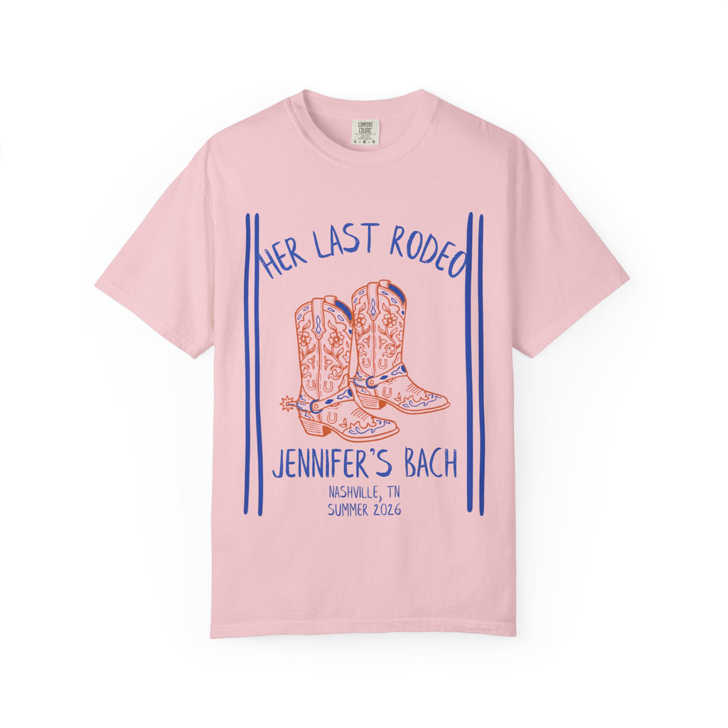 Pink t-shirt with "Her Last Rodeo" and cowboy boots graphic.