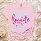 Pink t-shirt with "bride" text accented by a diamond and bow graphic.