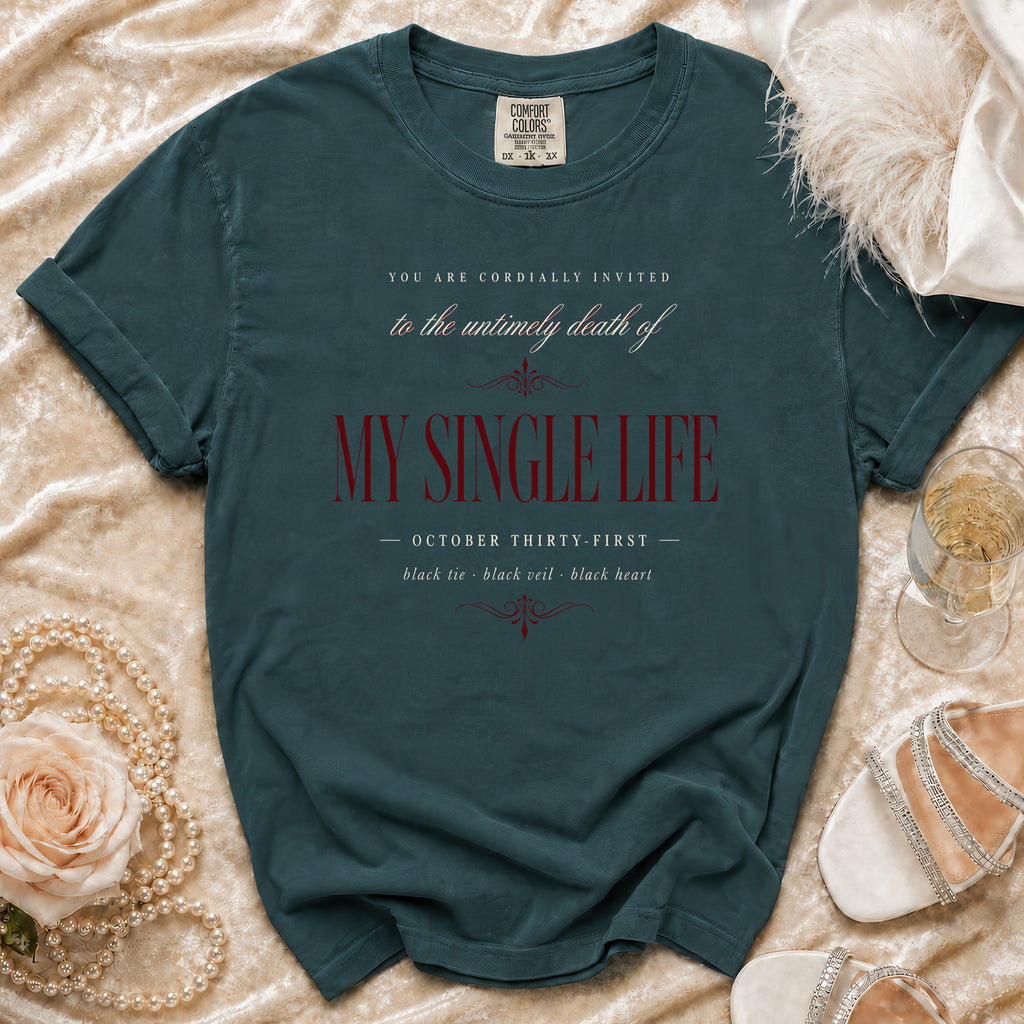 Teal t-shirt with "My Single Life" text, October 31, black tie, black veil, black heart.