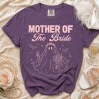 Purple t-shirt with "Mother of The Bride" text and a ghost bride graphic.