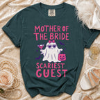 Teal t-shirt with "Mother of the Bride Scariest Guest" text and a ghost graphic.