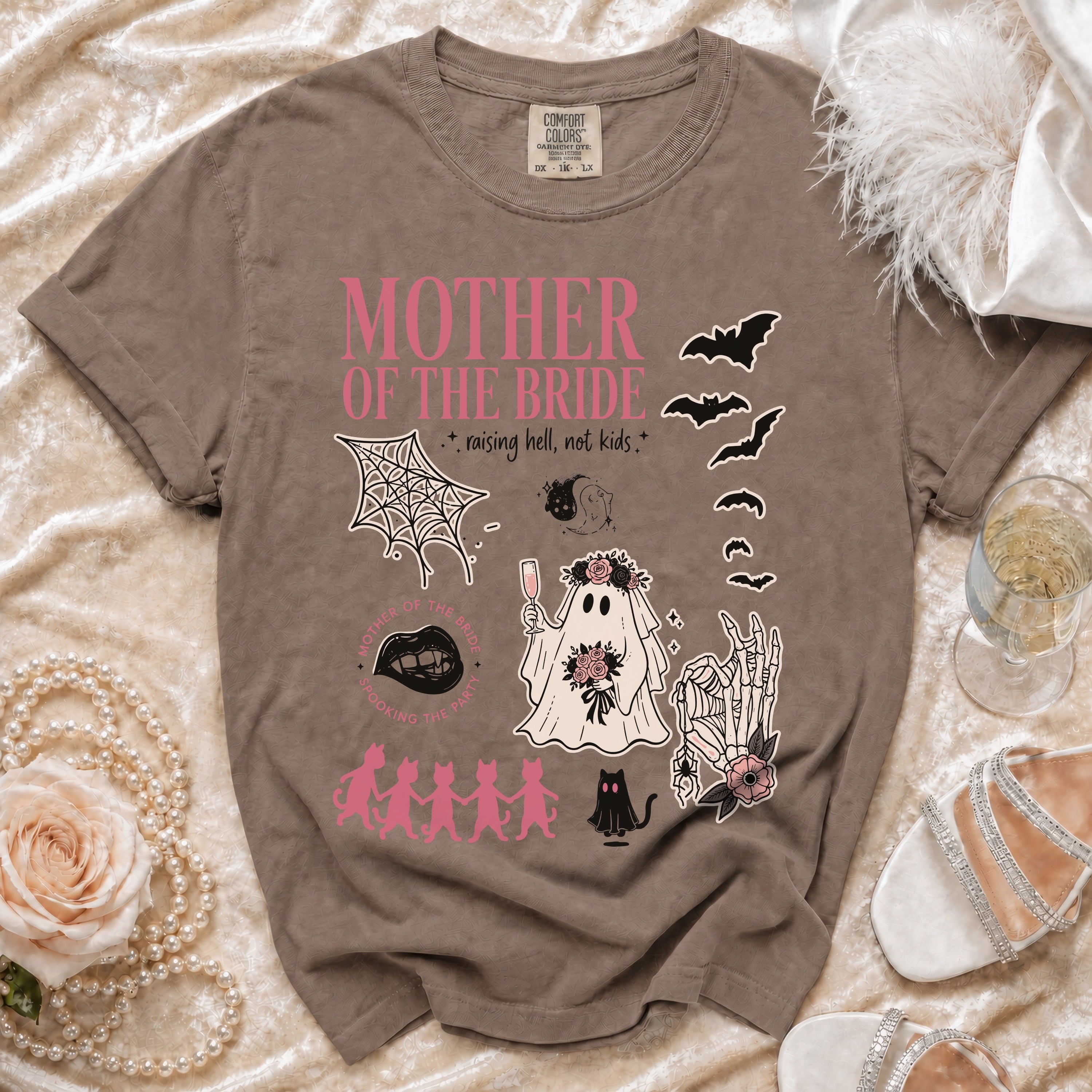 Brown t-shirt with "Mother of the Bride" text and Halloween-themed graphics.
