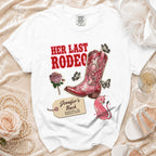 White t-shirt with "Her Last Rodeo" and cowboy boot design, Jennifer's Bach, Nashville TN.
