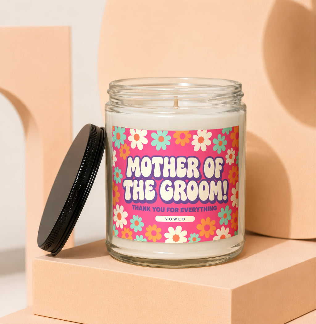 Glass candle with floral label reading "Mother of the Groom! Thank you for everything"