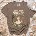 Brown t-shirt with text "HOLY SHIT I'M GETTING MARRIED" and bridal graphic.