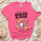Pink t-shirt with "Olivia's Bach Reckless In Texas" and Western graphics.
