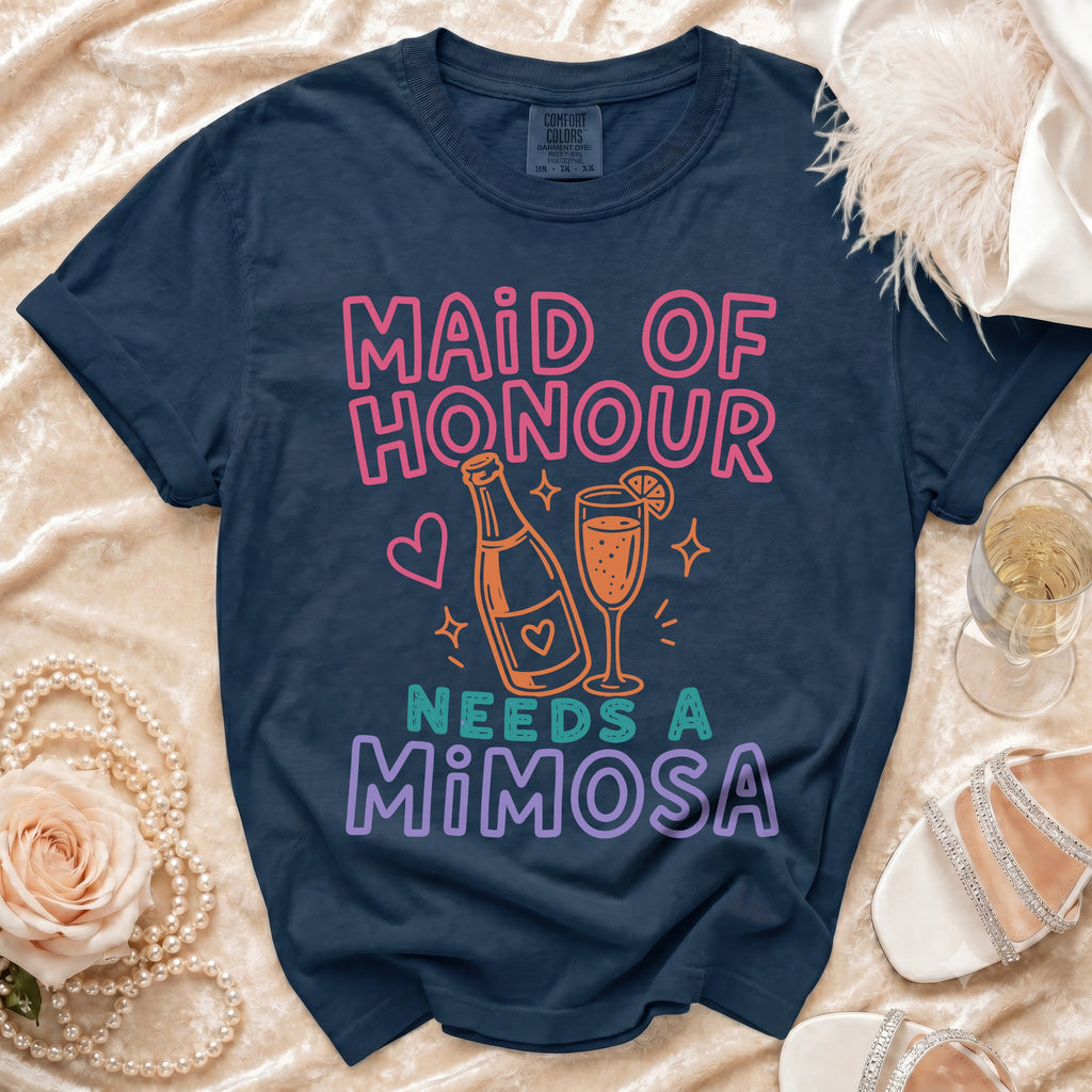 Navy t-shirt with "Maid of Honour Needs a Mimosa" text and mimosa graphics.
