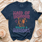 Navy t-shirt with "Maid of Honour Needs a Mimosa" text and mimosa graphics.