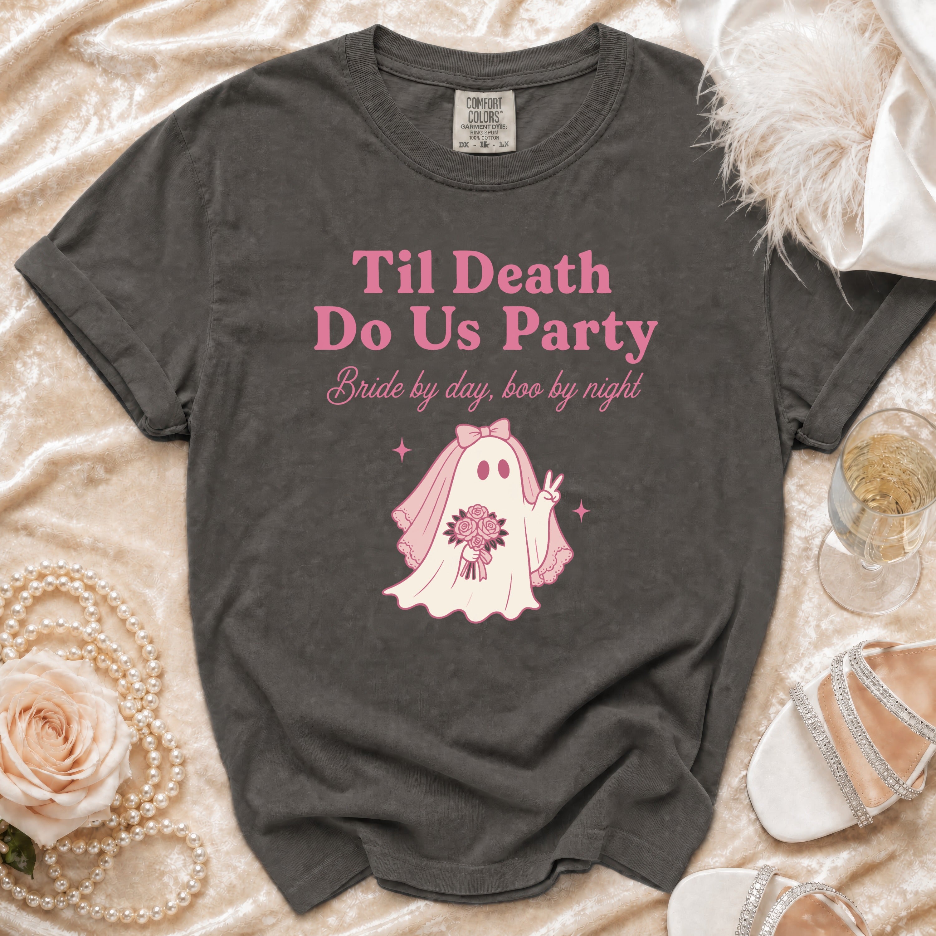 Dark gray t-shirt with pink text and ghost graphic: "Til Death Do Us Party, Bride by day, boo by night."